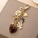 WESTERN HEART CROSS HAT BOOT HEART BAG CHARM | 80K096: GOLD