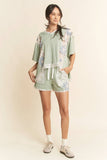 Sage shorts with floral patch detail