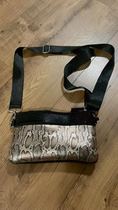 metallic snake sling bag